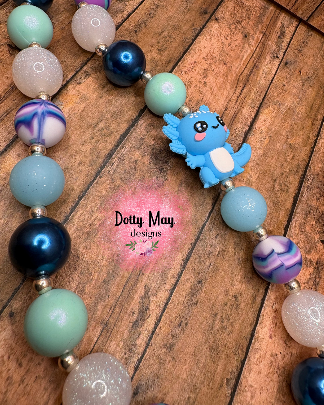 6a619c6ea15b5f2766344e95_blue-axlotl-chunky-necklace-1_1788219260884.png