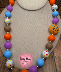 6a619c6ea15b5f2766344e95_cookie-necklace_1786411096107.png