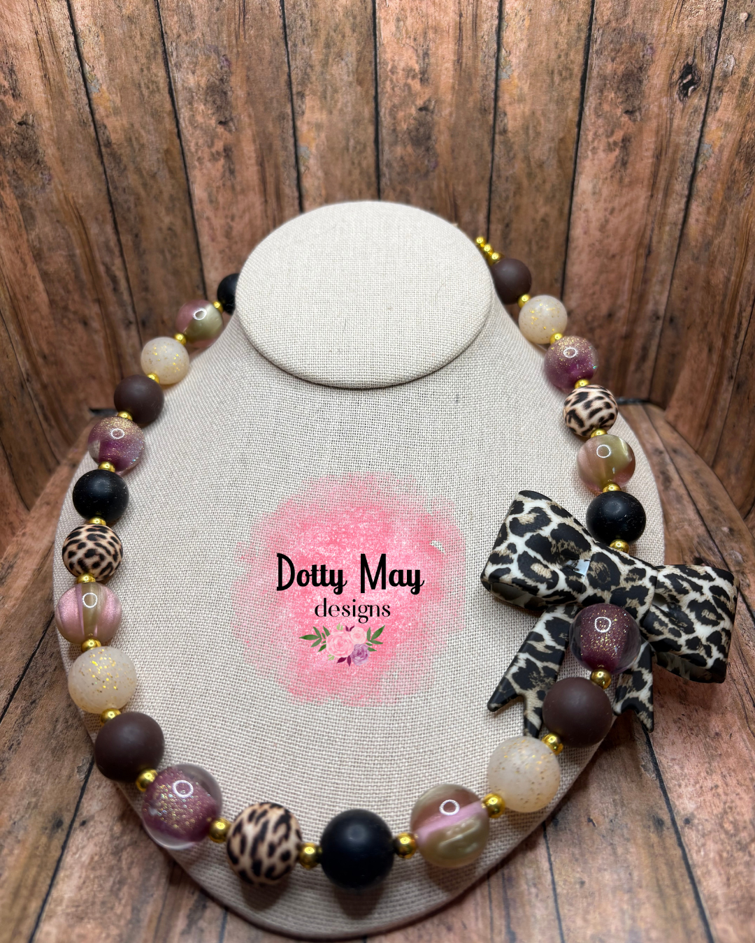 6a619c6ea15b5f2766344e95_leopard-bow-necklaces-omm_1786412434220.png