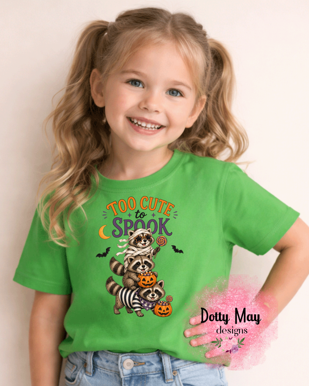 6a619c6ea15b5f2766344e95_too-cute-to-spook-racoon-mockup-green_1788801740647.png
