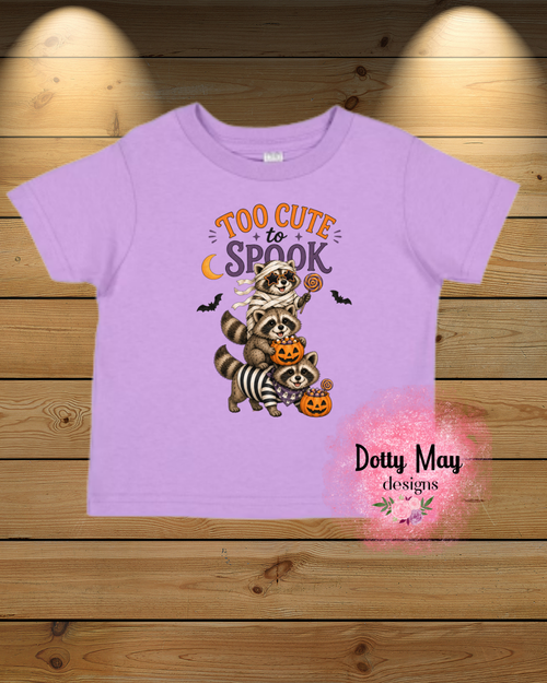6a619c6ea15b5f2766344e95_too-cute-to-spook-racoon-mockup-lavender_1788801735252.png